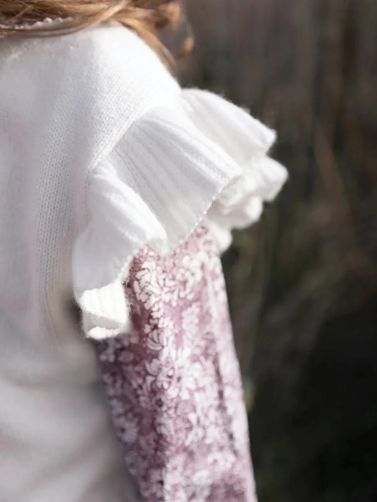 Sleeveless Ruffle Sweater